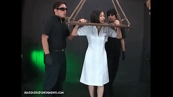 Horny Asian Submissive Bound In Wooden Stocks And Dominated free video